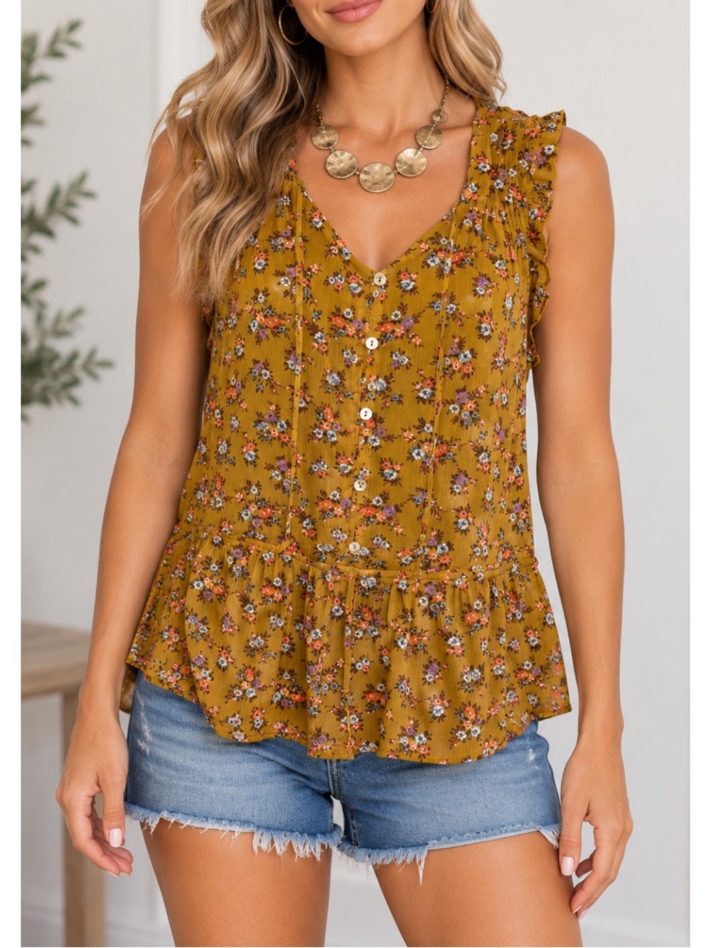 Mossimo sleeveless Mustard Yellow sheer blouse with a multi-colored floral print
